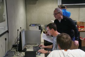 Rauchende Köpfe im Wettkampfbüro Rauchende Köpfe im Wettkampfbüro